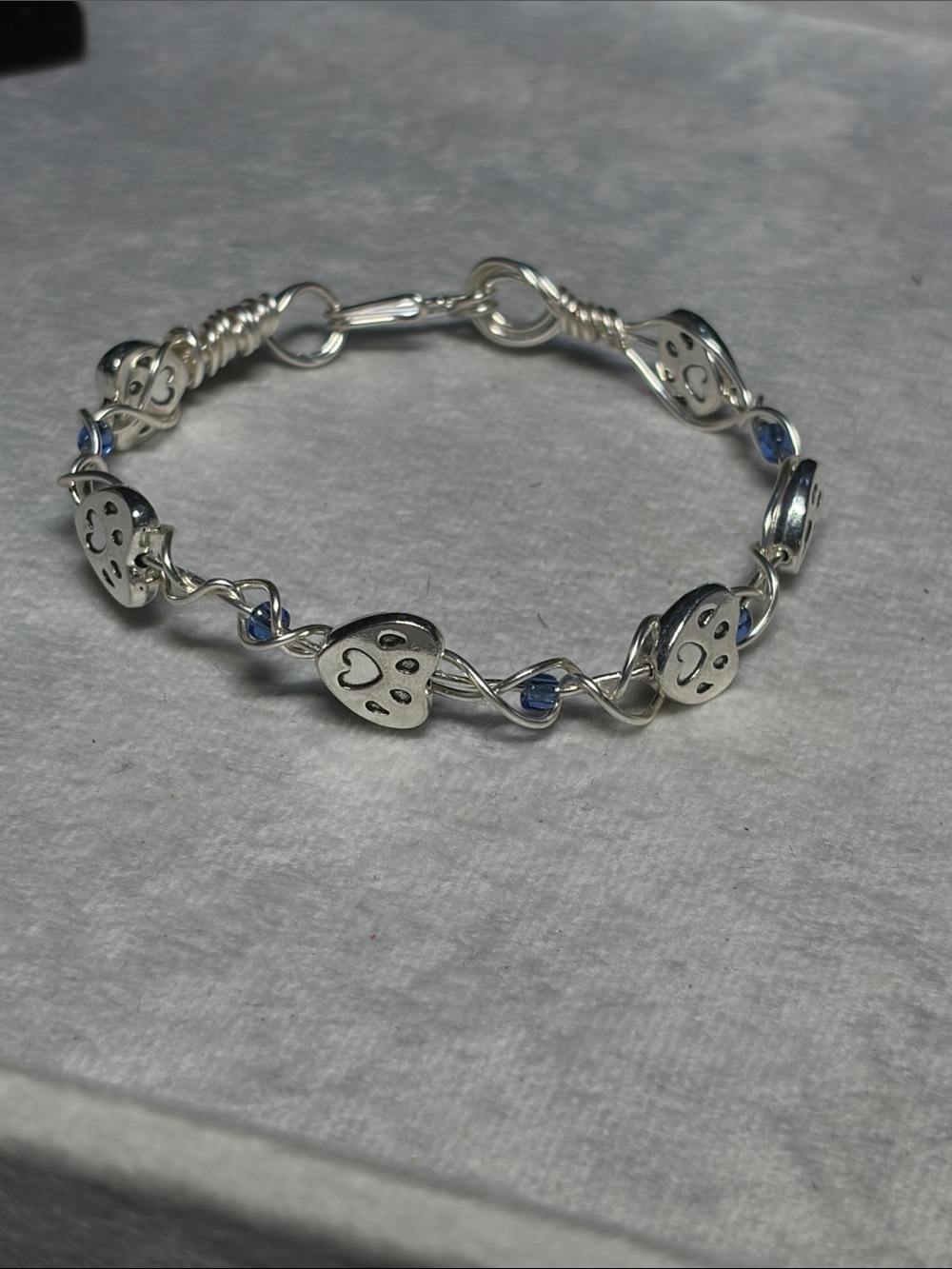 Artistic Silver Wire Paw Print Heart Charm Bracelet with Blue Accents